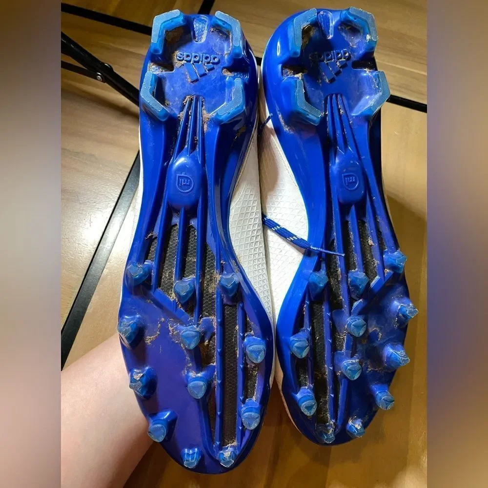 Adidas blue and white cleats‎